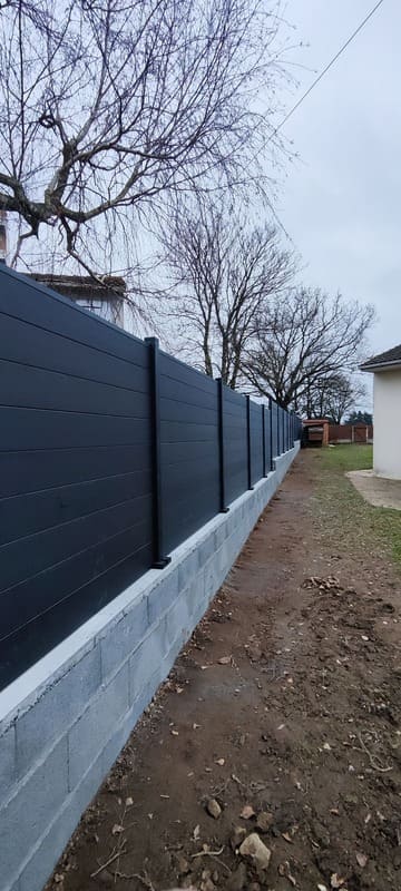 Rénovation et reprise d'une clôture extérieure